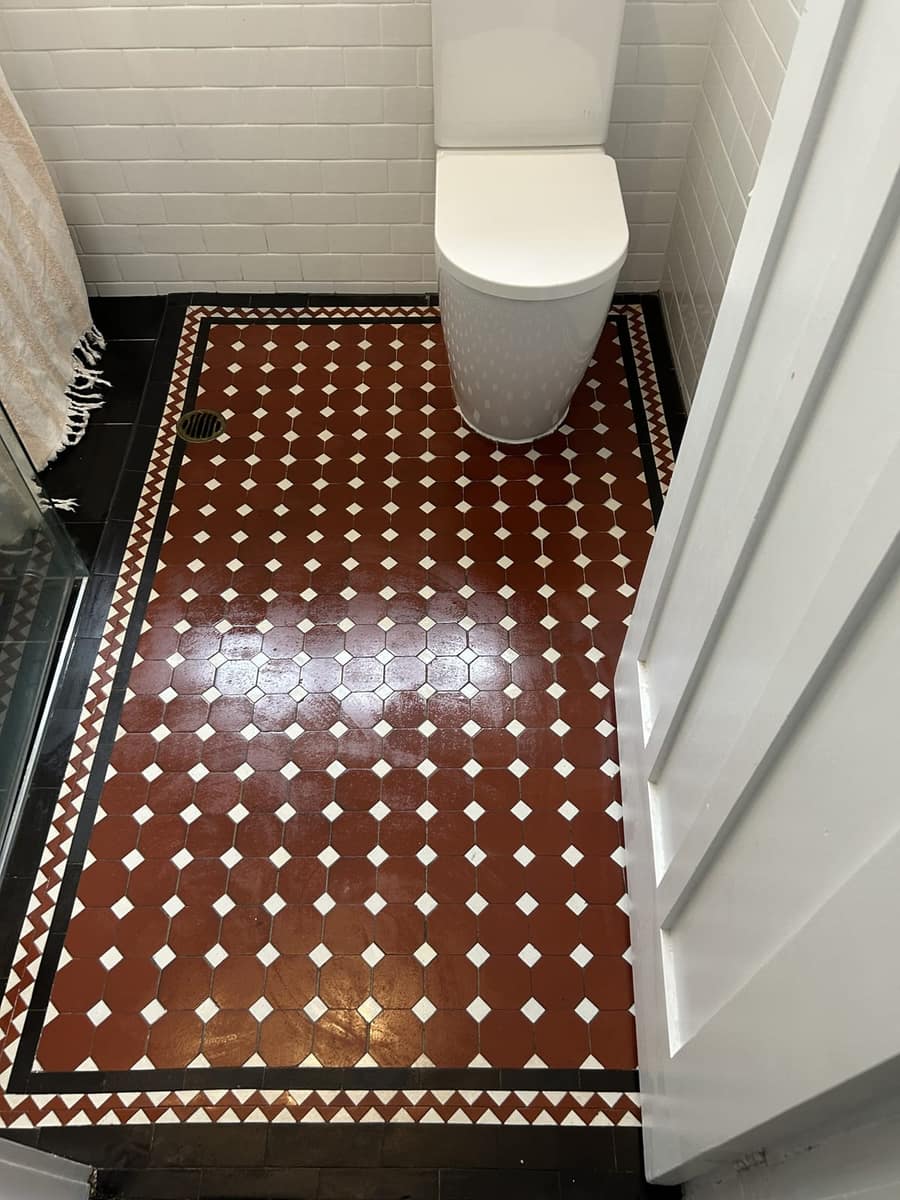 Brick red, white and black Octagon and Dot shower floor with a Balmain border, seen from the doorway, Randwick